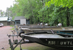 Boat fleet and main station building at Trout Lake Station,