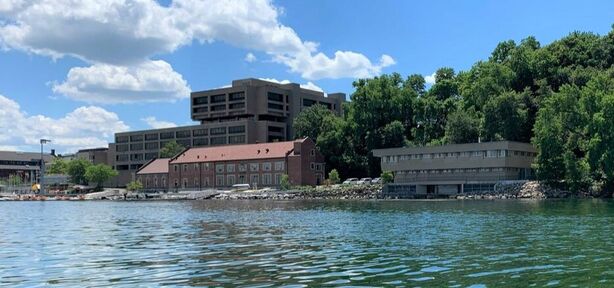 View of CFL Hasler Lab (right) and Water Science and Engineering (left) from Lake Mendota.
