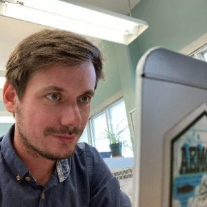 Robert Ladwig took selfie of himself working at his computer on a lake model.